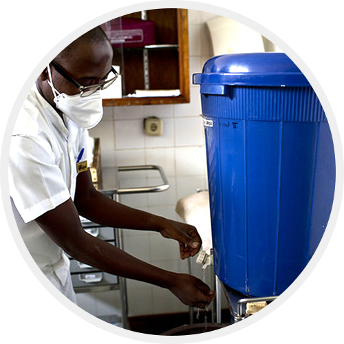 A healthcare worker washing his hands