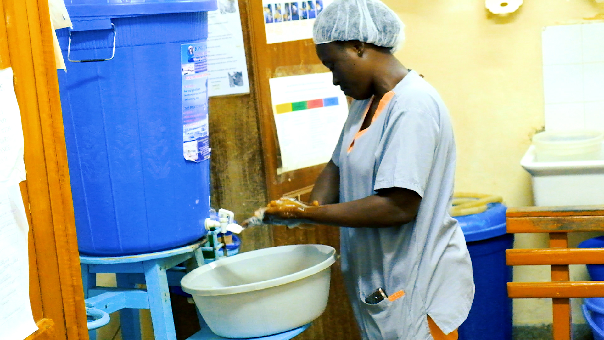 A healthcare worker washing her hands